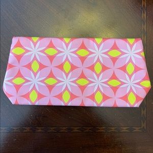 Clinique multi colored print cosmetic bag.